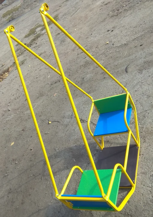 Дитячі гойдалки "човник" на жорсткій підвісці.