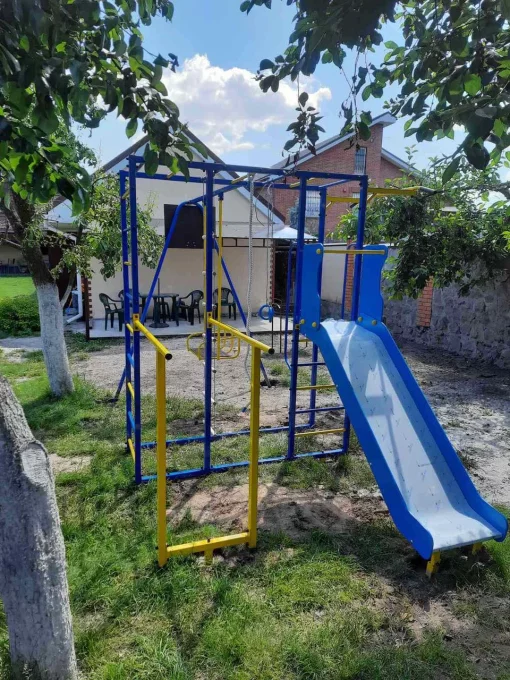 Дитячий спортивно-ігровий комплекс з гойдалкою і гіркою з нержавійки
